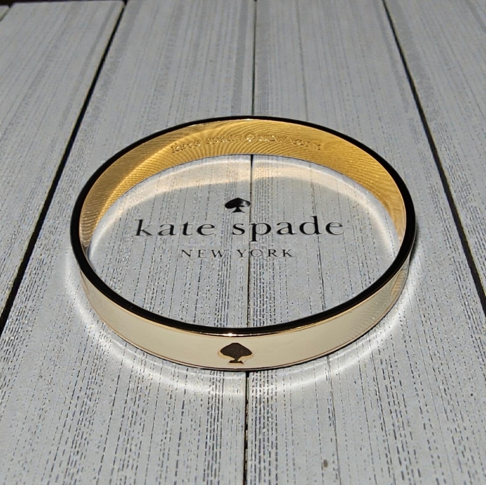 KATE SPADE Cream Enamel Bangle with Spades & Interior In Gold Tone